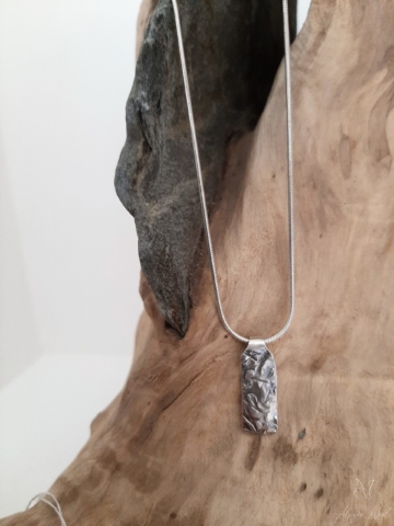 Pendentif empreinte